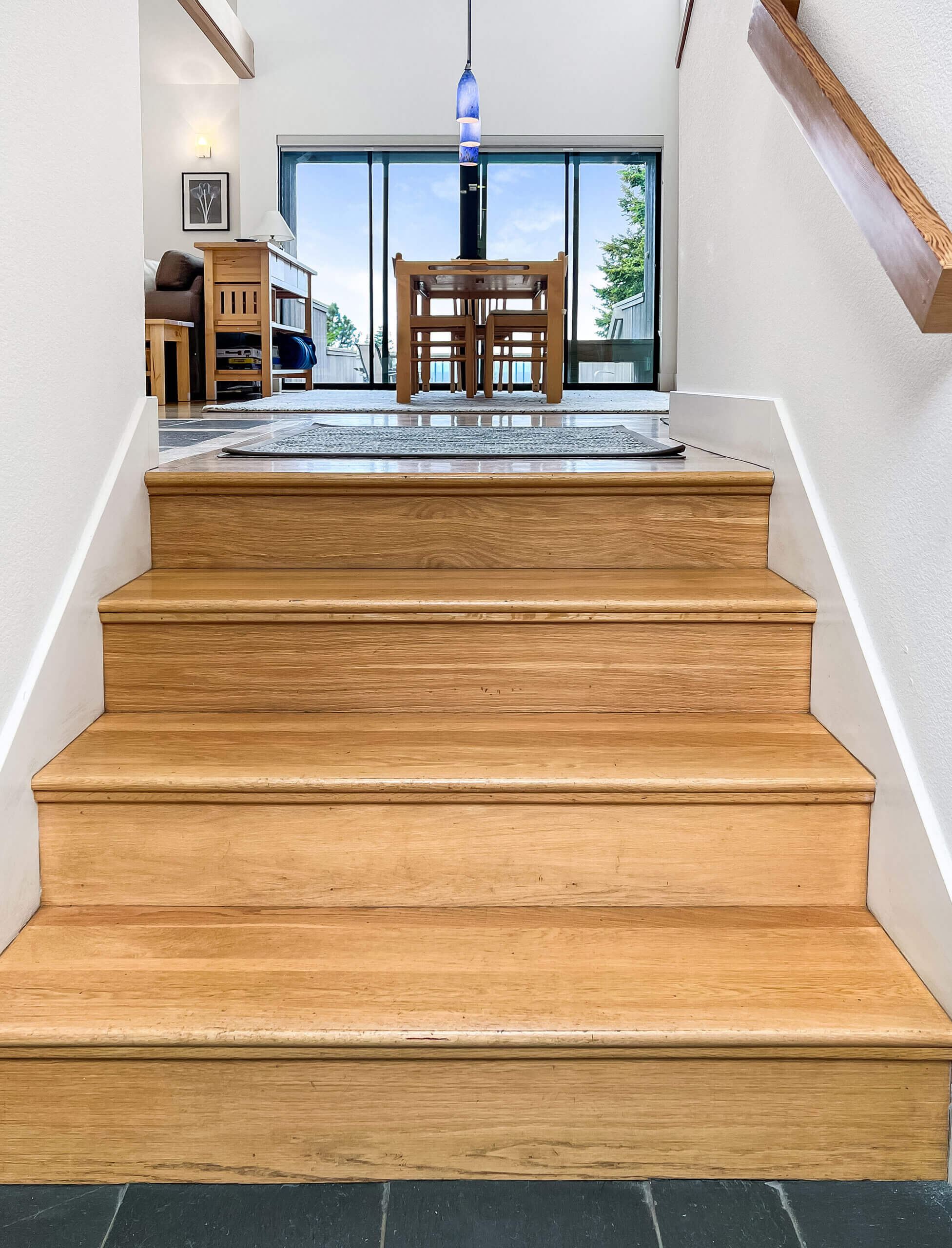 Sea Ridge wooden stairs up to great room