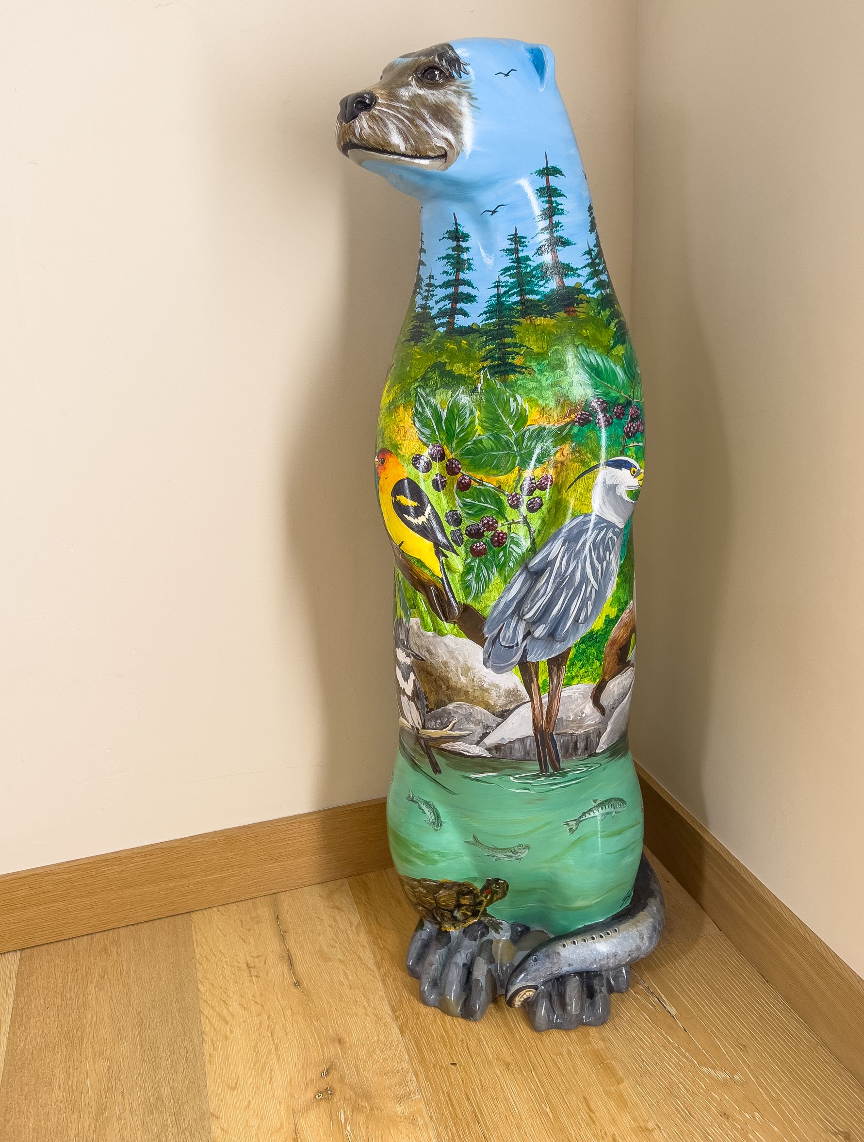 Solstice - colorful painted whimsical sculpture of otter