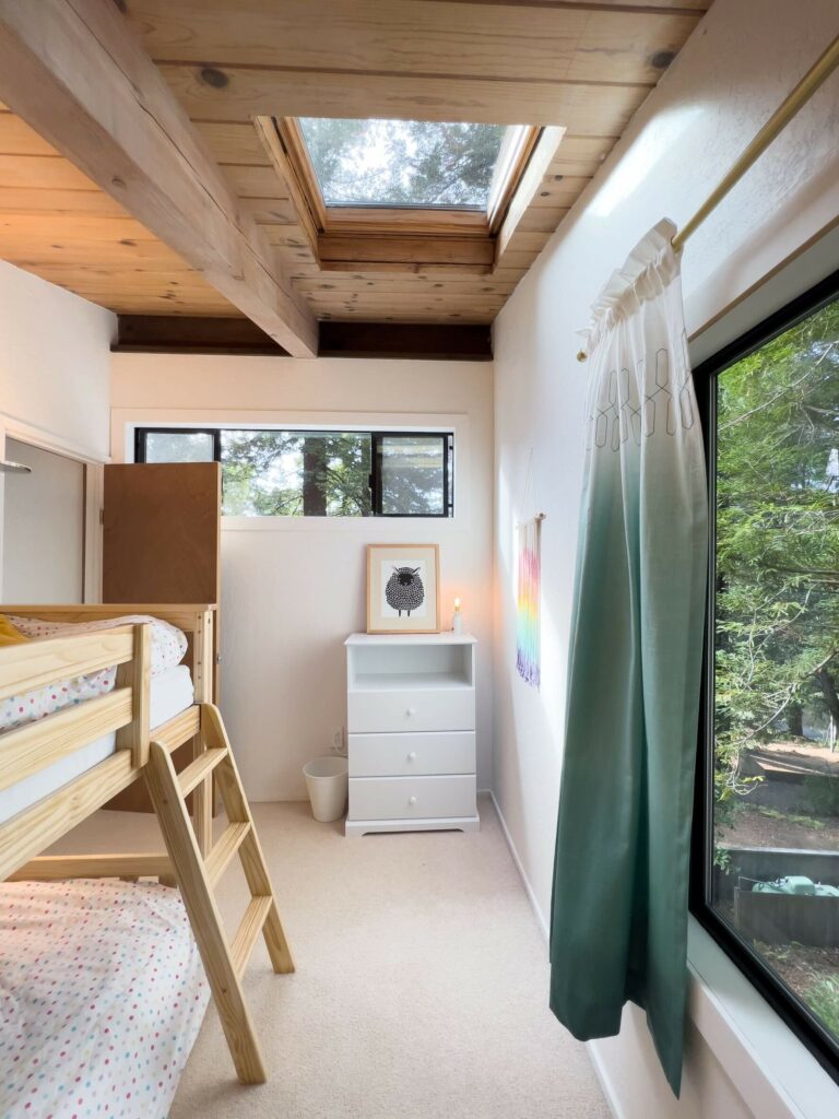 Sea Pony - 3rd floor bright bedroom with wood bunk beds and large window