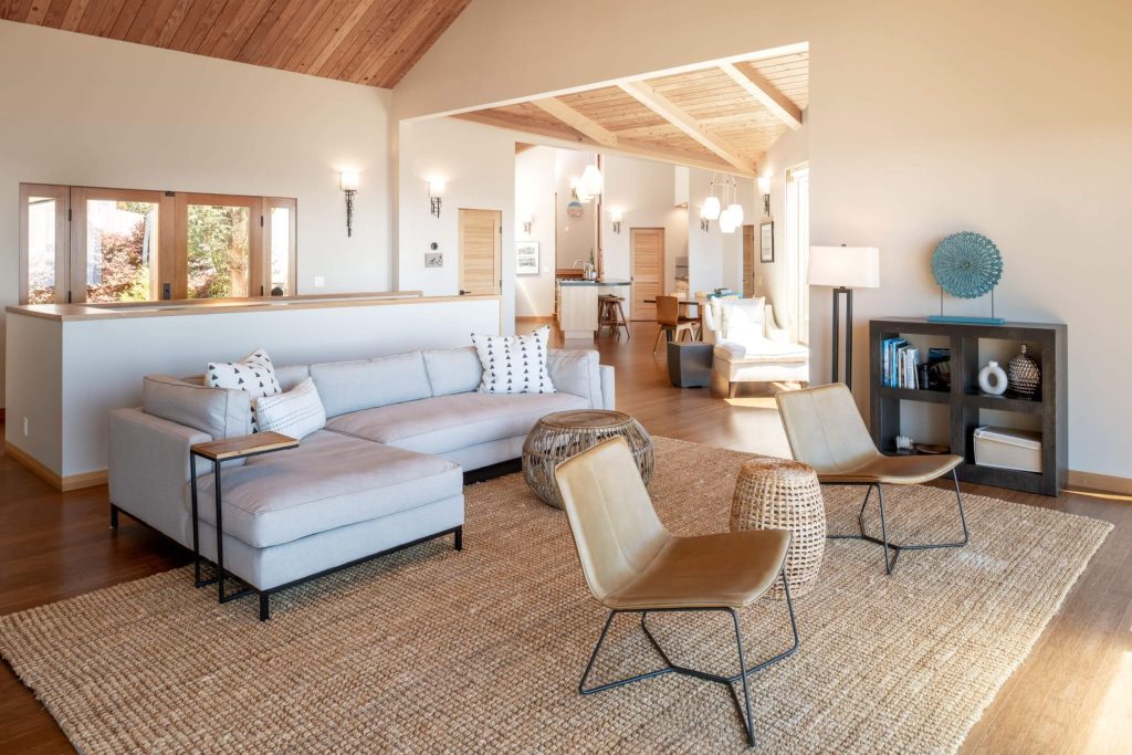 Cornwall West - bright open plan living area hardwood floors and large sofa