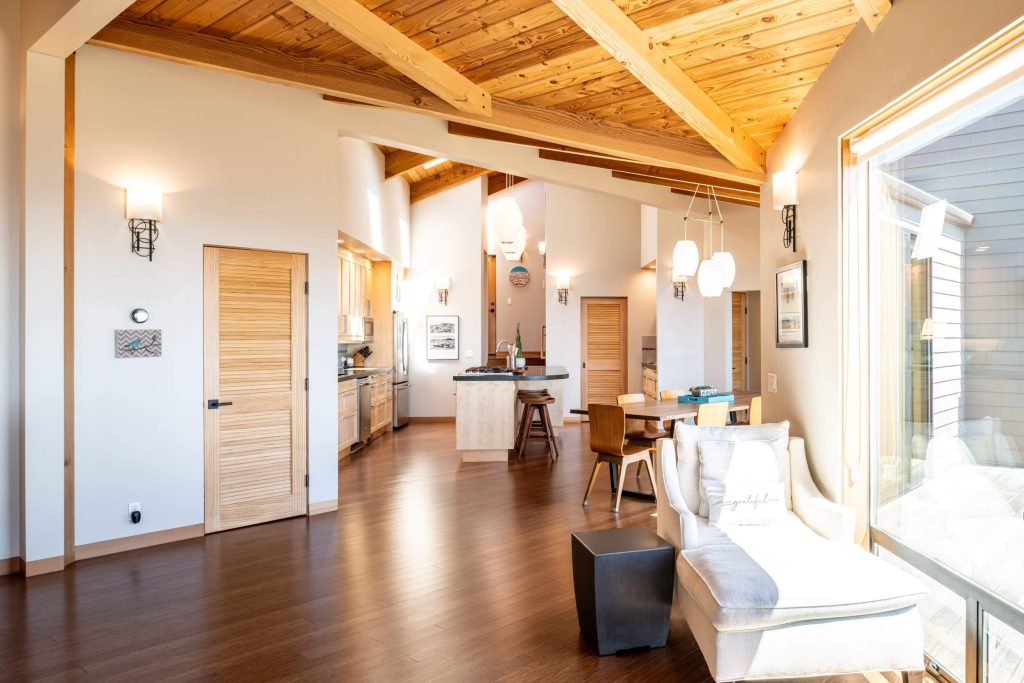 Cornwall West - view of living room to large open kitchen and dining room area.